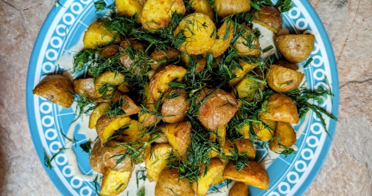 Potatoes with green sauce and tahini